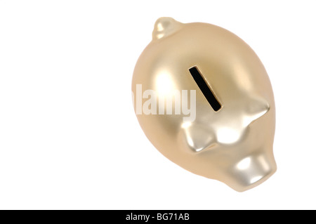 Golden salvadanaio isolati su sfondo bianco Foto Stock