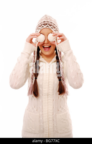 Giovane ragazza di indossare un abbigliamento caldo essendo cheeky Foto Stock