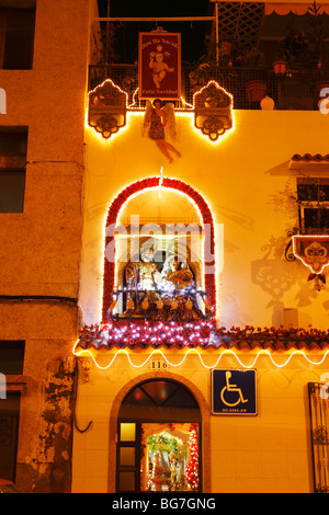 Le luci di Natale a casa in Spagna Foto Stock