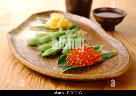 Antipasto e sake Foto Stock