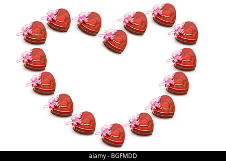 A forma di cuore scatola regalo disposti in forma di forma di cuore simbolo Foto Stock