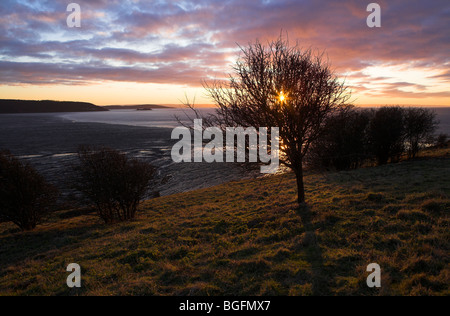 La baia di sabbia al tramonto, Weston-Super-Mare, Somerset, Regno Unito in gennaio. Foto Stock