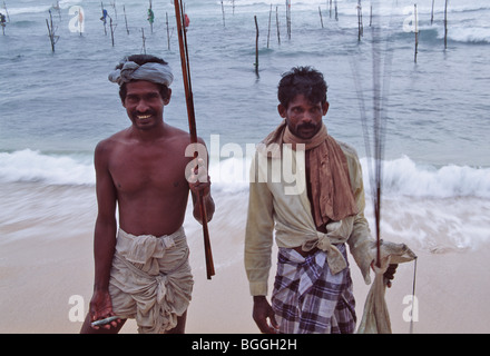 I pescatori con stilt, Weligama, Sri Lanka Foto Stock