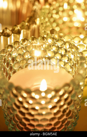 Tealight candele in cestelli portabicchieri Foto Stock