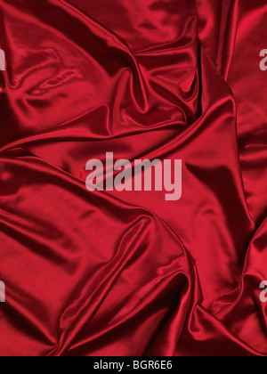 Rosso lucido tessuto setoso sfondo Foto Stock