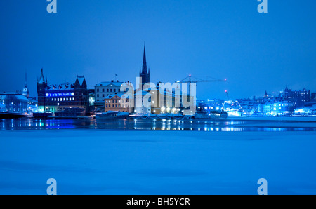 Stoccolma vista invernale di Riddarfjärden e l isola di Riddarholmen. Foto Stock