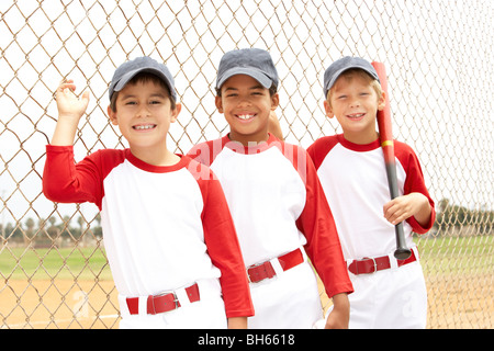 Ragazzi in squadra di baseball Foto Stock