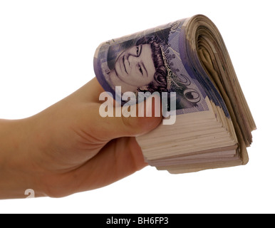 Uomo con un rotolo di venti pound note Foto Stock