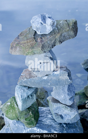 Inukshuk da acqua Foto Stock
