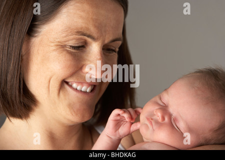 Azienda madre Neonato Foto Stock