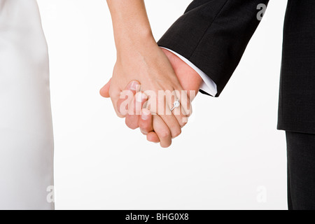 Sposa giovane Holding Hands Foto Stock