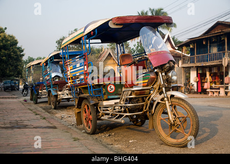 Tuk tuks in Luang Prabang laos Foto Stock