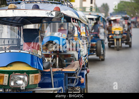 Tuk tuks in Luang Prabang Foto Stock