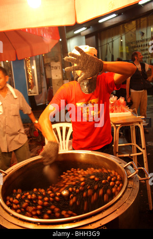 Castagne arrosto , Bangkok Chinatown , della Thailandia Foto Stock