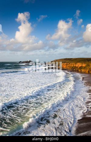 Godrevy da scogliere Gwithian; Cornovaglia Foto Stock