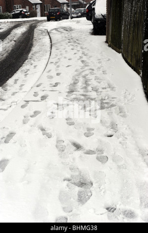 Orme nella neve Foto Stock