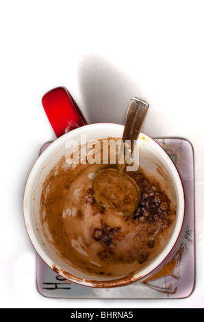 Bevuto mezza tazza di caffè froffy Foto Stock