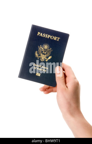 Mano che tiene il passaporto Foto Stock