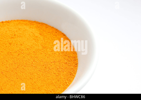 Close-up di curcuma in polvere da Charles W. Lupica Foto Stock