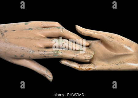 Alterò le mani del manichino in plastica bambola. Foto Stock