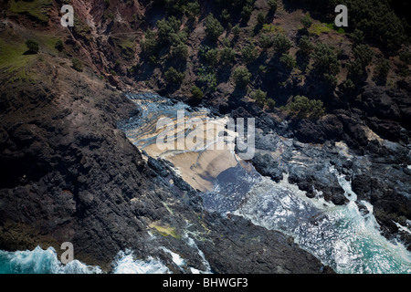 Fuoriuscita di olio lavaggio fino sul litorale Moreton Island Queensland Australia Foto Stock