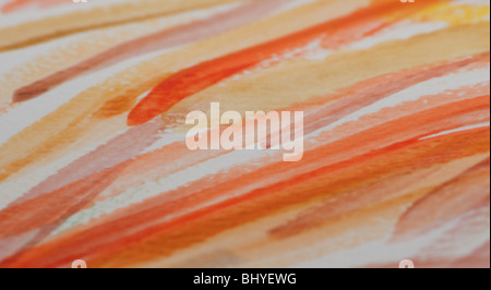 Questa foto è un morbido e caldo colore sfondo astratto con colpi di luce di acquerelli in rosso, arancio, giallo, oro e marrone chiaro Foto Stock