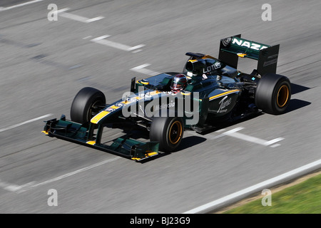 Jarno Trulli alla guida per il 2010 Lotus F1 racing team al circuito di Montmelo, Barcellona, Spagna Foto Stock