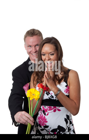 Bella giovane donna riceve fiori. Isolato. Macchina fotografica: Canon 5D Mark II Foto Stock