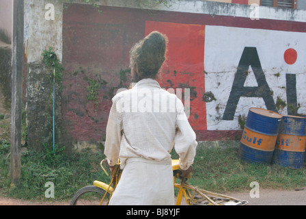 Tipico stile dei capelli di un villaggio uomo in Kerala, India Foto Stock