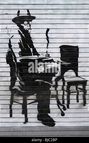 Stencil graffiti su un negozio di fronte a Exmouth market, Islington, Londra, Inghilterra, Regno Unito. Foto Stock