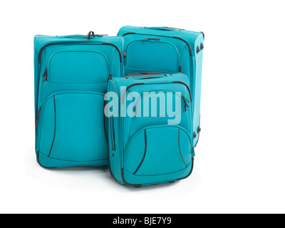 Tre valigie blu isolato su sfondo bianco Foto Stock