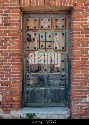 Vecchia porta di legno, tipico di Castiglia - La Mancha (Don Chisciotte della terra) Foto Stock