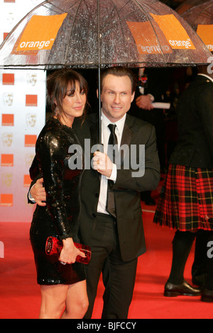 TAMARA MELLON & Christian Slater ORANGE BRITISH ACADEMY FILM AWARDS Royal Opera House Covent Garden di Londra COVENT GARDEN LON Foto Stock