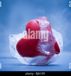 Cuore con ghiaccio su di esso Foto Stock