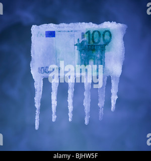 Denaro ricoperto di ghiaccio Foto Stock