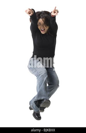 Casualmente vestito donna salta Foto Stock