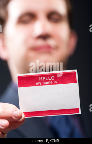 Uomo con nome vuoto tag Foto Stock