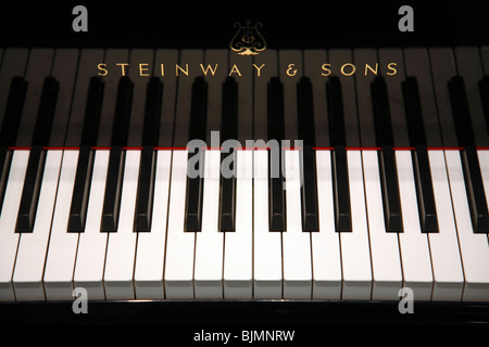 La tastiera di un pianoforte Steinway Foto Stock