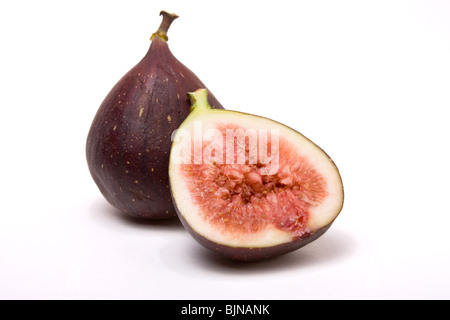 Le figure uno dimezzato isolata contro uno sfondo bianco. Foto Stock