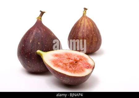 Le figure uno dimezzato isolata contro uno sfondo bianco. Foto Stock