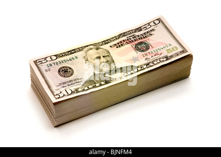 Pila di soldi americani su sfondo bianco Foto Stock