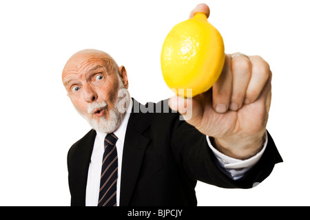 Business man tenendo il limone Foto Stock