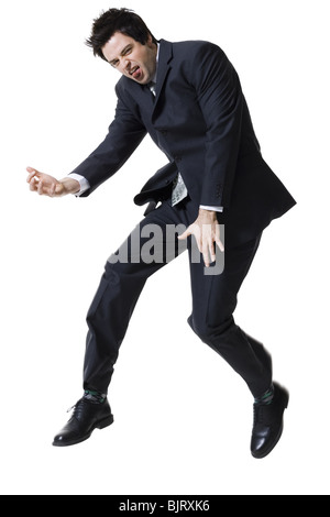 Businessman jumping Foto Stock