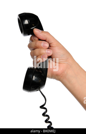 Mano d'uomo azienda vintage ricevitore telefono isolato su sfondo bianco Foto Stock