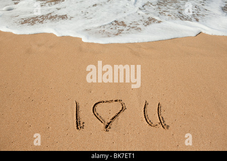 Ti amo scritto in sabbia Foto Stock