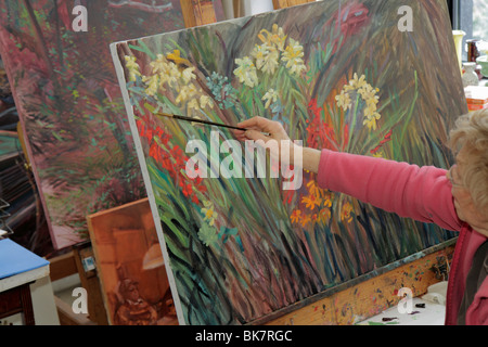 Alexandria Virginia, Old Town, Torpedo Factory Art Center, artista in residenza, pittura, fiori di fiori, adulto, adulti, anziani, anziani anziani anziani anziani anziani anziani ci Foto Stock