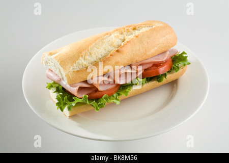 Prosciutto e pomodoro panino sulle baguette Foto Stock