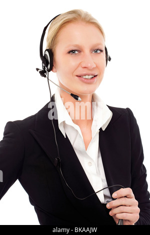 Ritratto di un giovane operatore caucasica sorridente con cuffie e microfono Foto Stock