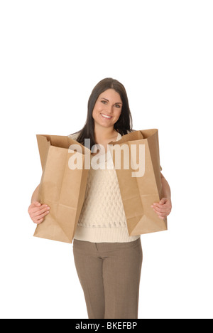 Donna attraente con due carta marrone borse per lo shopping. Foto Stock