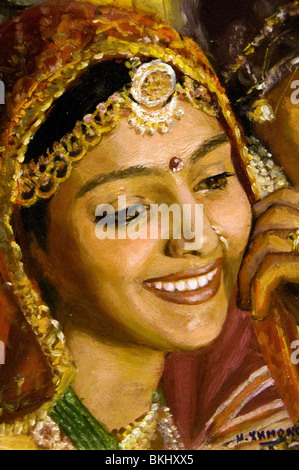 Pittura bella giovane donna in un sari in India Rajasthan Jaisalmer donna gioiello vestiti con zirconi Foto Stock